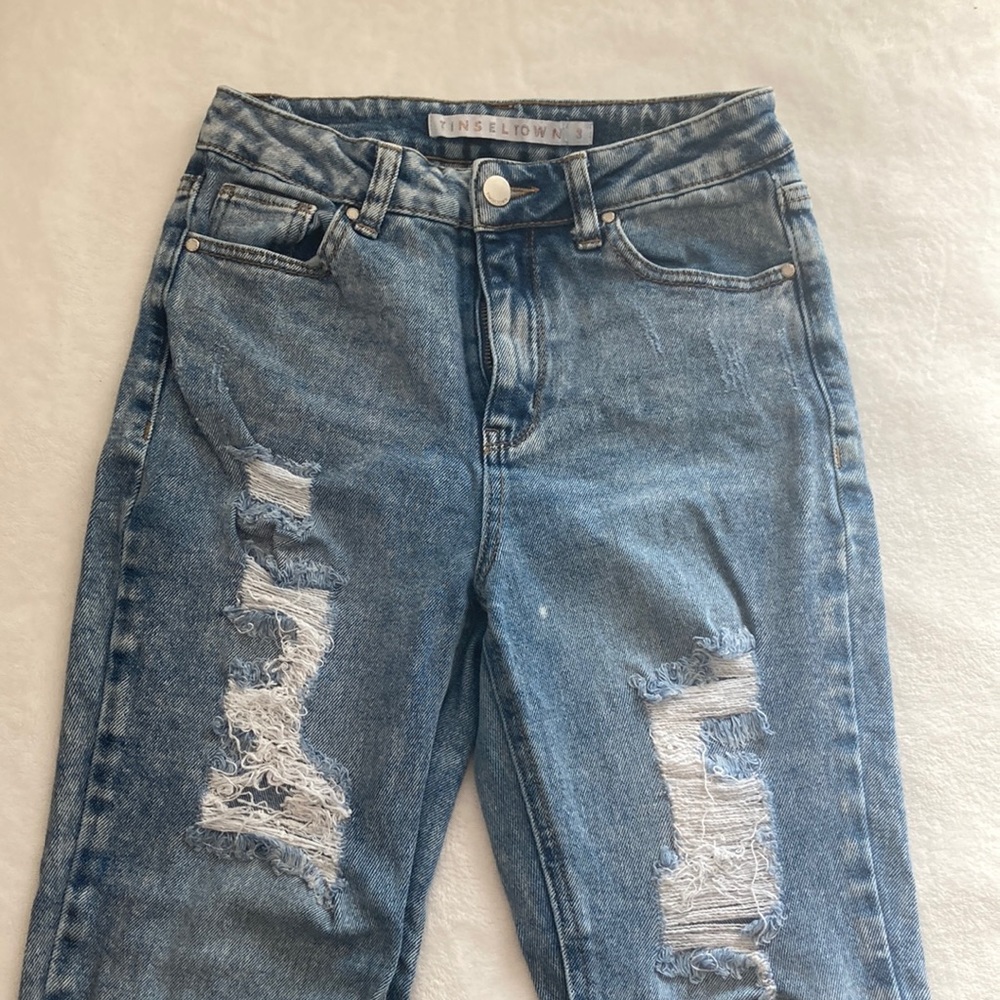 High waisted skinny jeans with rips/frayed look